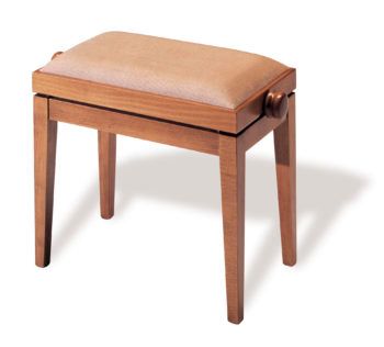 A wooden stool with brown leather seat and handle.