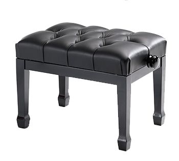 A black piano bench with a tufted seat.
