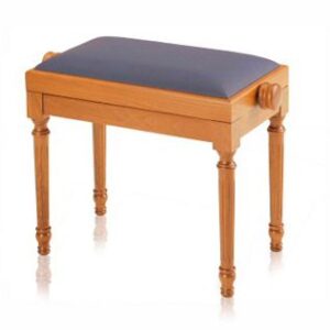 A wooden bench with blue seat cushion on top of it.